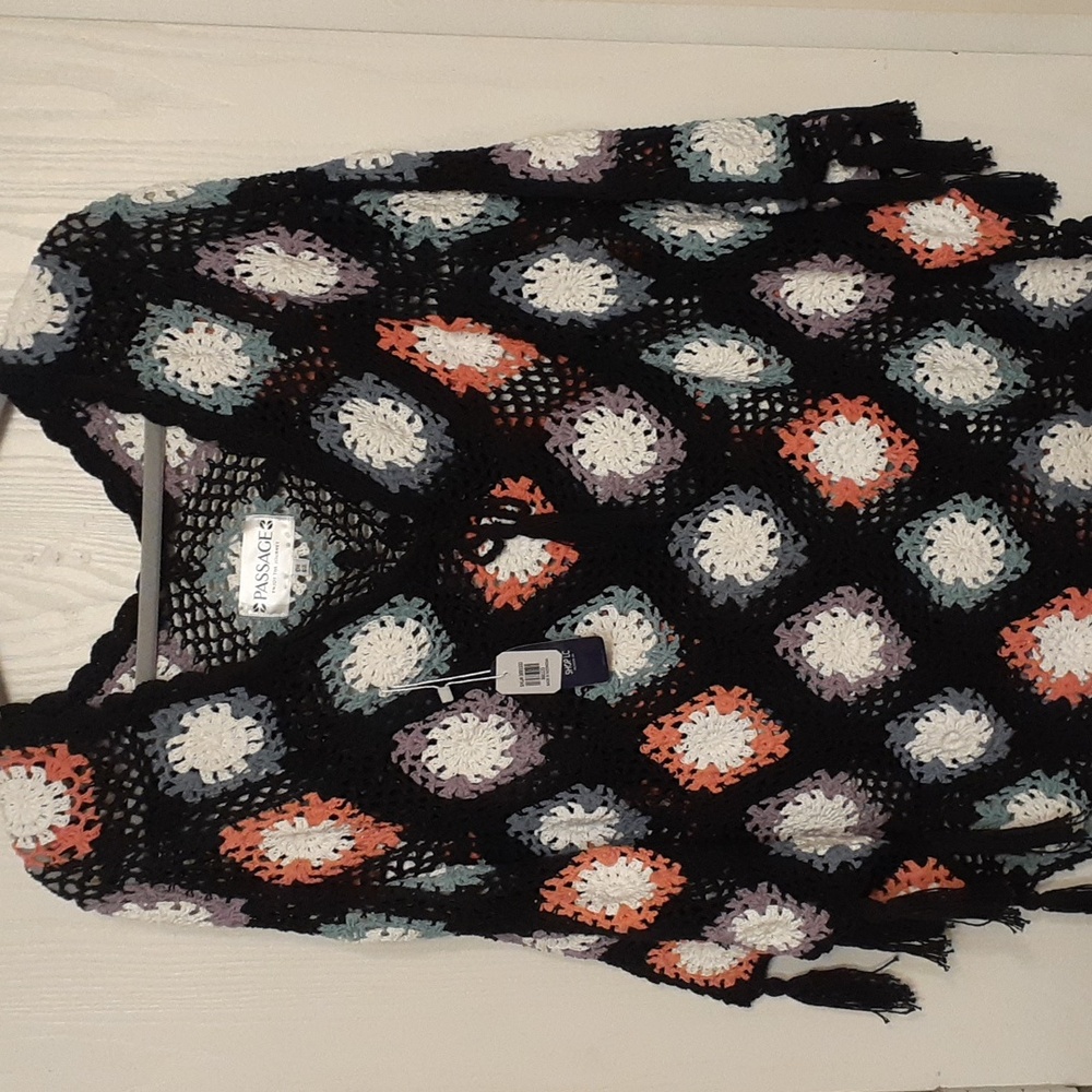 multi colored crochet granny square poncho.